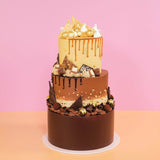 3 Tier Cake - Design Your Own with chocolate, caramel drip, and assorted decorations by Crumbs & Doilies
